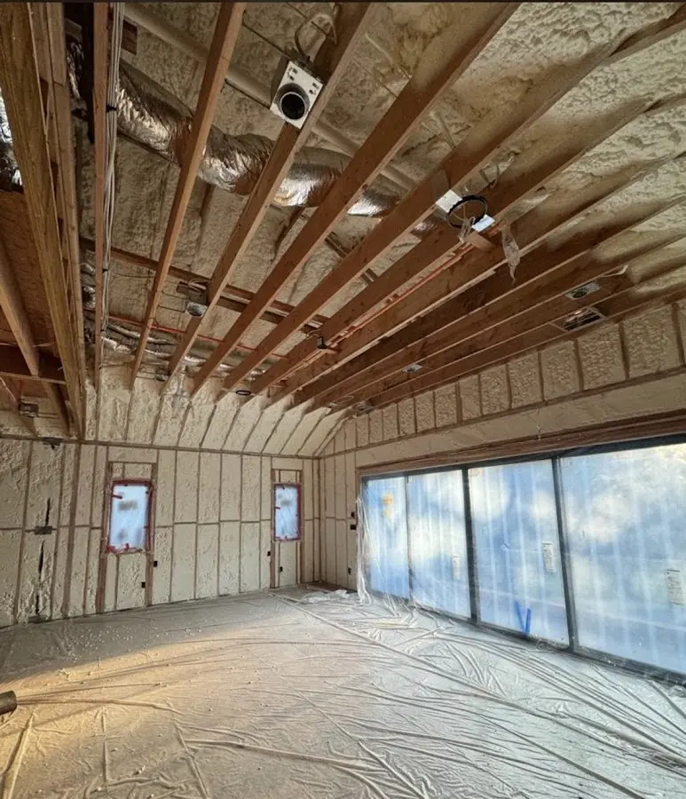 Interior walls and ceiling insulated with spray foam during new construction in Evergreen Park